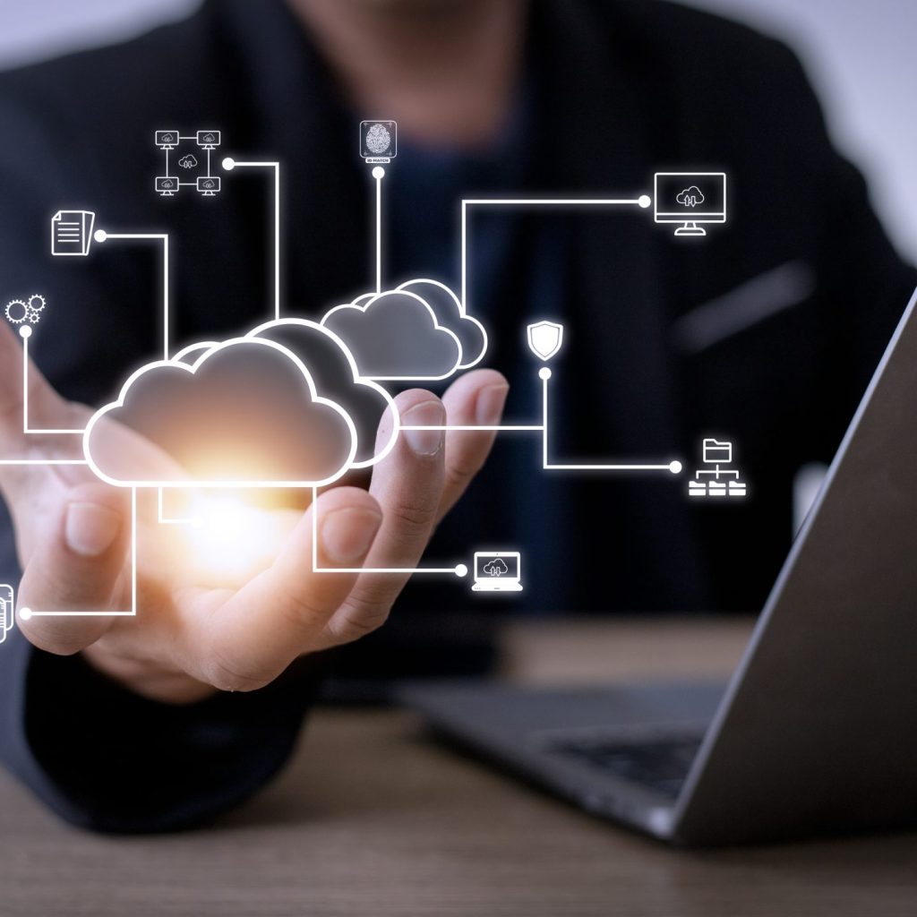 Businessman with cloud computing diagram show on hand. Cloud technology. Data storage. Networking and internet service concept.